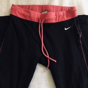 Nike pink and black pants